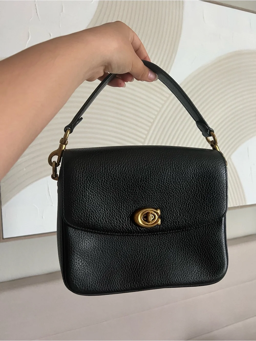 Coach Cassie Black Pebbled Leather Top-Handle Bag with Gold Turnlock